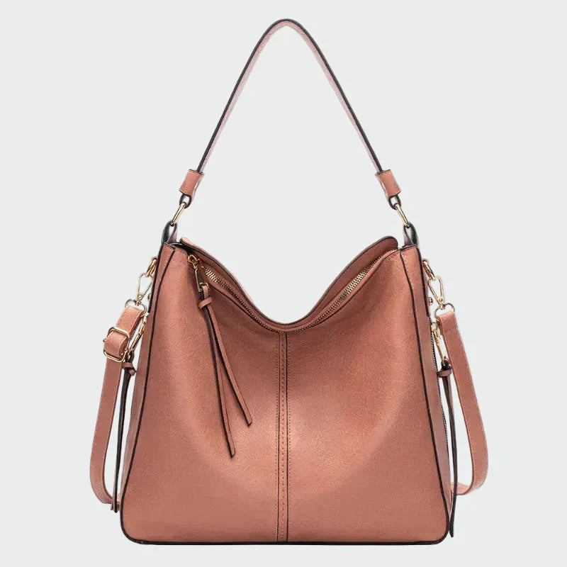 Nóra | Elegantna crna torbica sa zlatnim detaljima