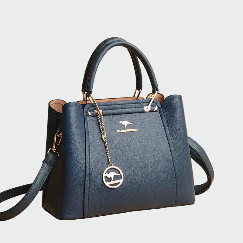 Sára | Elegantna crna torba s zlatnim akcentima